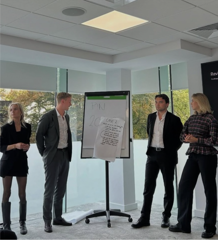 People in front of a whiteboard